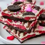 Delicious Valentine's Oreo Bark decorated with red and pink sprinkles.