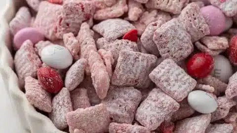 Valentine's Day themed Muddy Buddies snack with red and pink colors