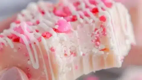 Valentine's Day sugar cookie fudge topped with sprinkles