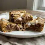 Delicious homemade Cookie S'mores Bars with chocolate and graham crackers
