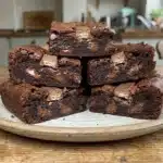 Delicious Kit Kat brownies topped with chocolate and crunchy Kit Kat bars