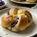 Mouthwatering ube cheese braided buns served for brunch