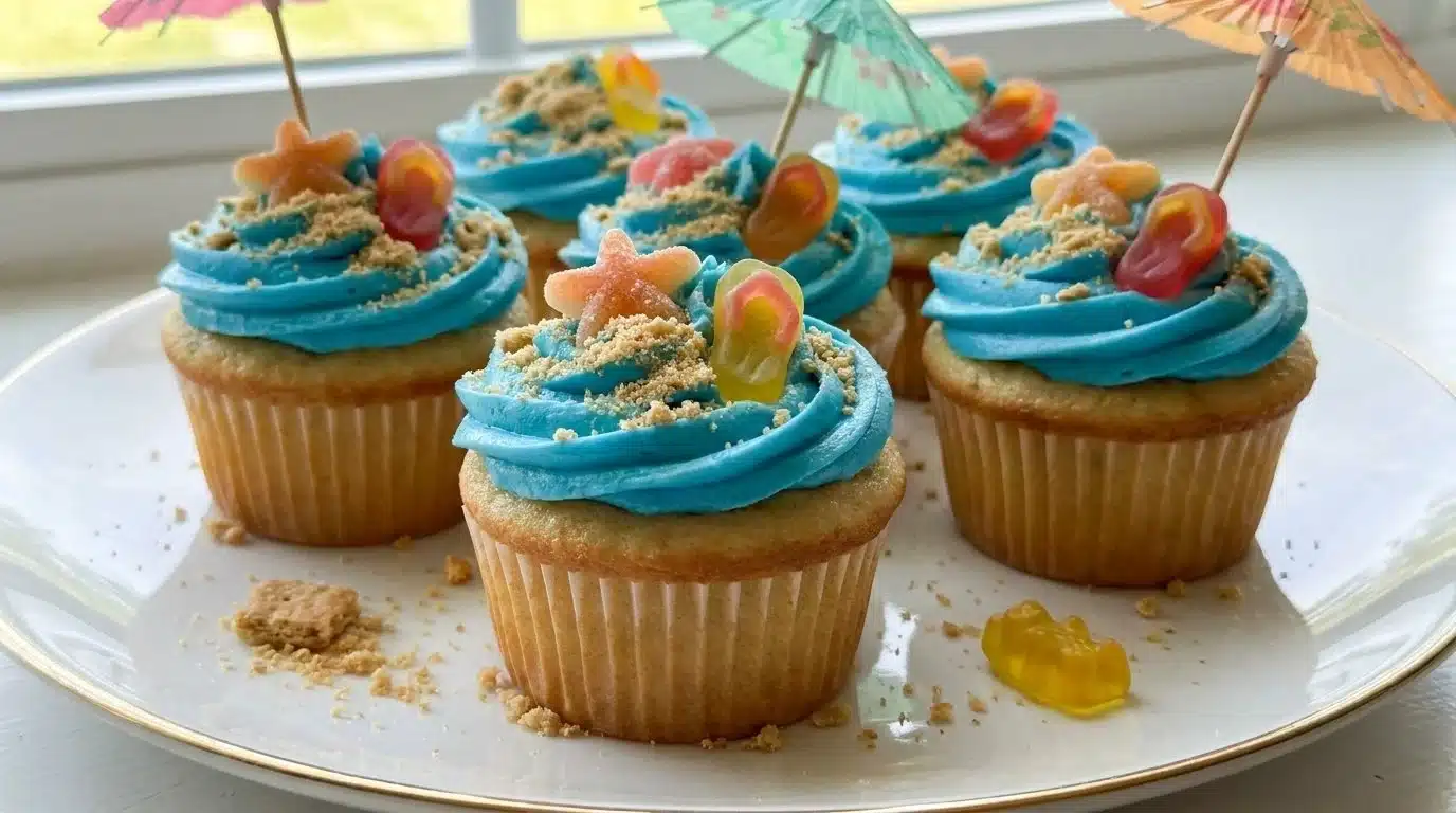 Delicious beach party cupcakes decorated with summer themes